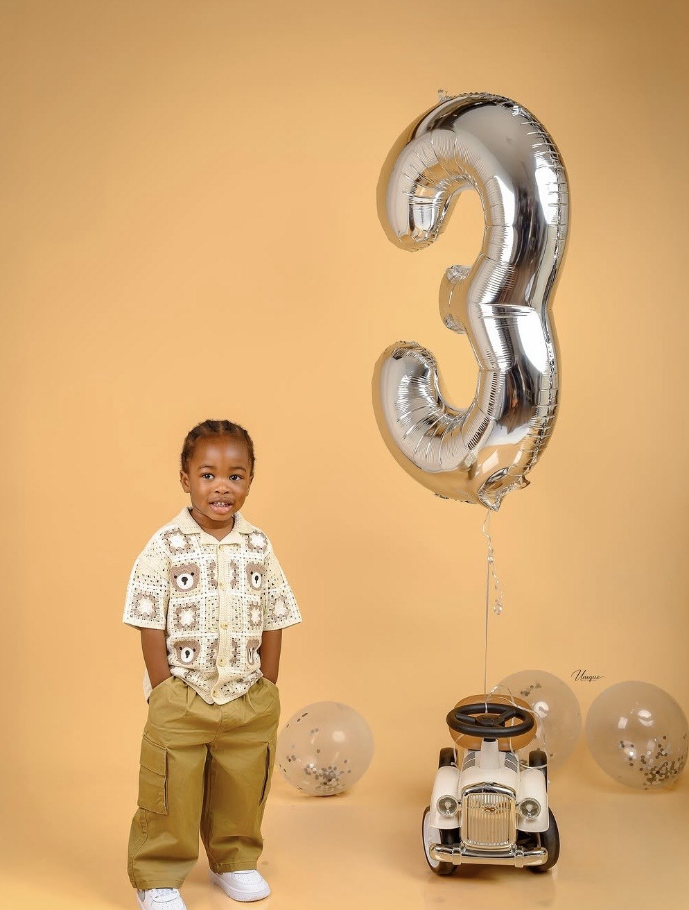 Third birthday studio portrait by Unique Photography