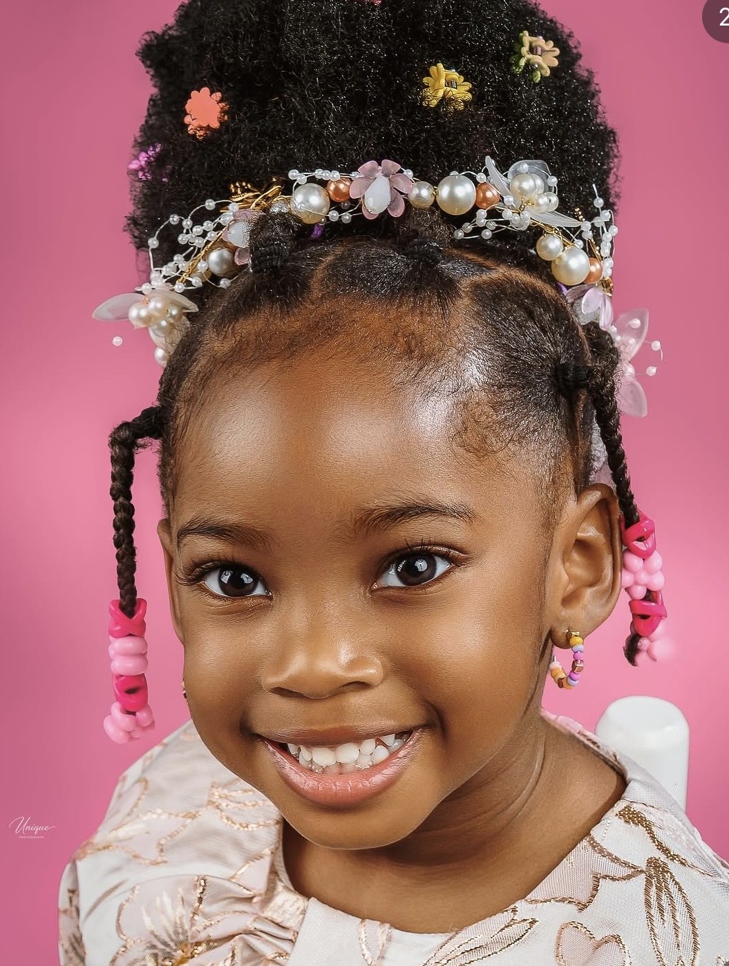 Children's studio portrait by Unique Photography